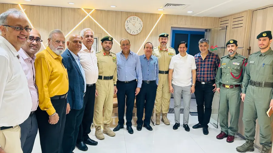 With officers of Al Raffa Police Station, 2024